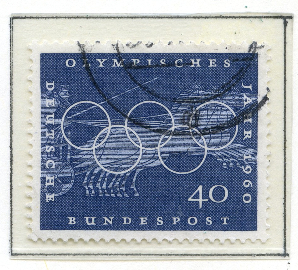 Syv frimerker med motiver fra de klassiske greske olympiske leker montert på albumark i størrelse A4. De første fire frimerkene viser øvelser fra de klassiske lekene med ol-ringene i forgrunnen, og ulik bakgrunnsfarge. Disse er utgitt i Tyskland, i fbm med sommer-OL i Roma 1960. Et frimerke utgitt i Paraguy i 1980 viser hodet til Satyros (gresk arkitekt fra antikken) plassert på et ark som viser ruinene etter Olympiastadion. De to siste frimerkene viser en gresk atlet fra antikken med de olympiske ringer over. Frimerkene er utgitt i Saarområdet (på gensen mellom Tyskland og Frankrike), som hadde sin egen olympiske komité i årene etter første og andre verdenskrig.