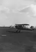 Flygplan J 11 märkt nr 26 tillhörande F 9, startar från flygfältet på F 21 Kallax, omkring 1942.

Bildtext vid foto: 