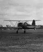 Flygplan J 11 märkt nr 26 tillhörande F 9 startar från flygfältet på F 21 Kallax, omkring 1942.

Bildtext vid foto: 
