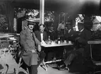 Arvid Eriksson till vänster dricker kaffe i Trädgårdsföreningen.

Bilder från Linköping tidigt 1900-tal. 

Arvid Augustin Eriksson fotograferade i Linköping under åren 1910-1950, han föddes i Linköping 1887-08-27. Arvid arbetade som frisör och drev sin egen frisersalong på Storgatan 13-15. 

Fritiden ägnade han åt segling och foto och han spelade även dragspel. Med dragspelet underhöll han ibland på fester, vintertid spelade han vid Linköpings skridskobana.