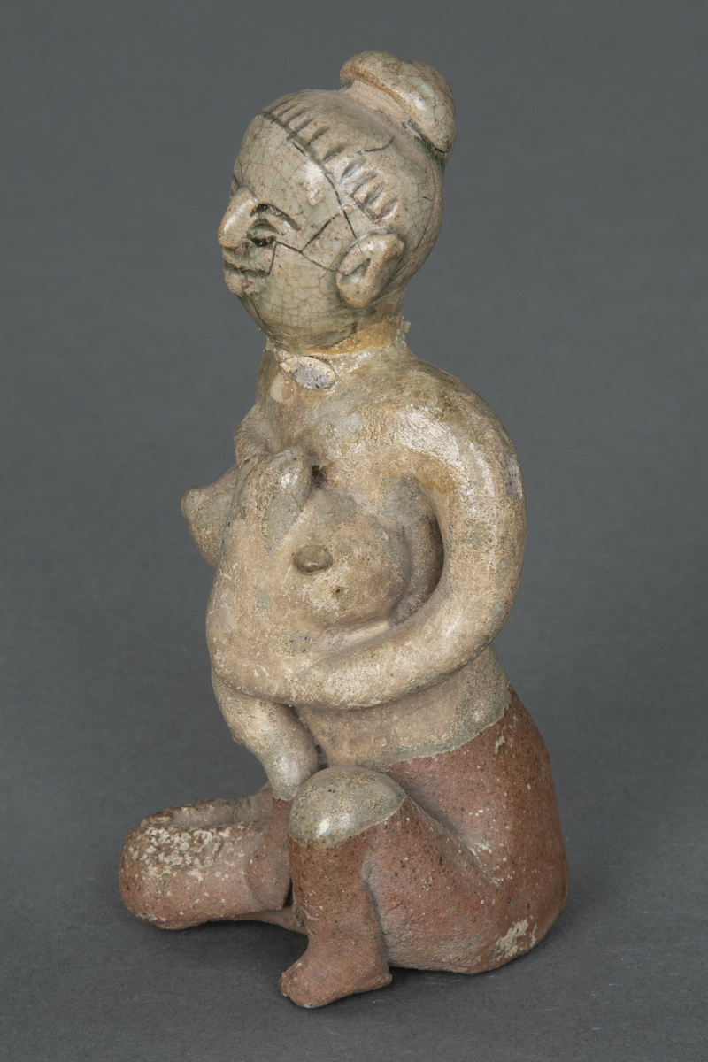 Fire figurer av mor og spedbarn.