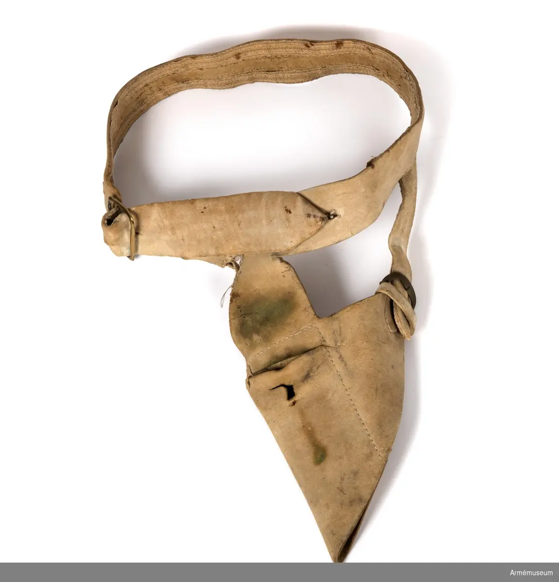 Livgehäng av gult sämskat läder med två mässingsspännen.