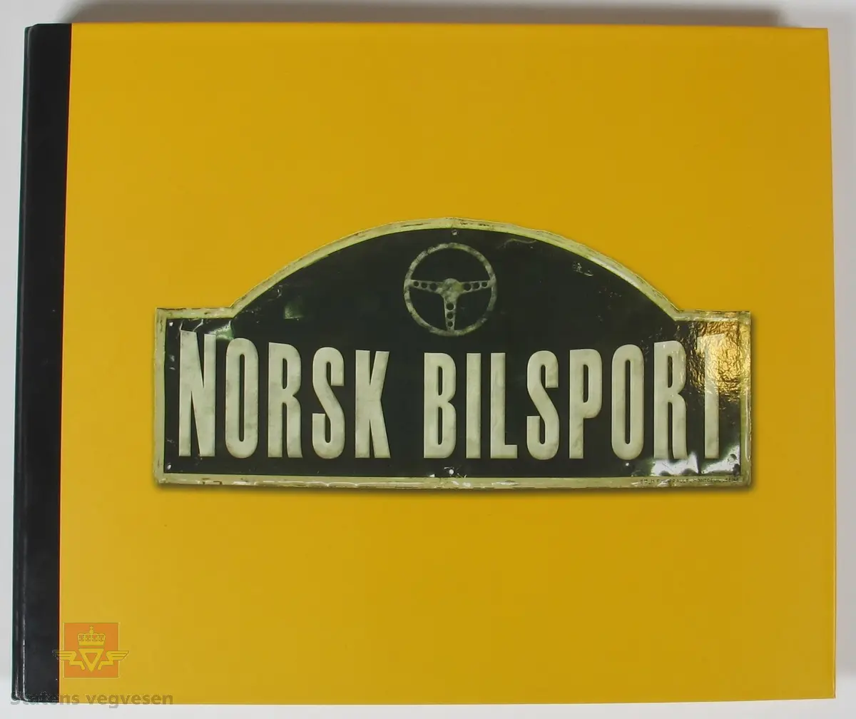 Hovedsaklig gul bok Laget av papp og papir. Det er plast lommer i boken som holder frimerkene på plass.