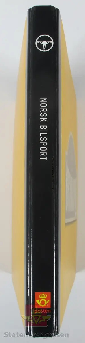 Hovedsaklig gul bok Laget av papp og papir. Det er plast lommer i boken som holder frimerkene på plass.