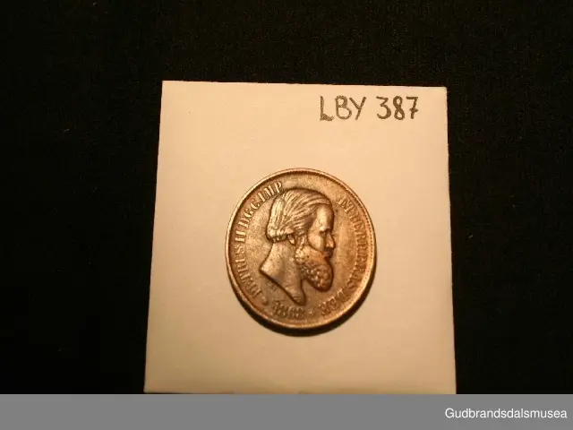 Mynt Brasil 20 reis,1868. PETRUS II D.G.C.IMP. ET PERP.BRAS.DEF. 20 R's. = Pedro II av Guds nåde Konstitusjonell keiser og evig forsvarer av Brasil 1868.