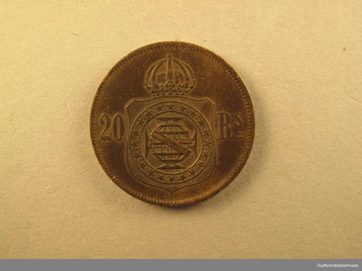 Mynt Brasil 20 reis,1868. PETRUS II D.G.C.IMP. ET PERP.BRAS.DEF. 20 R's. = Pedro II av Guds nåde Konstitusjonell keiser og evig forsvarer av Brasil 1868.