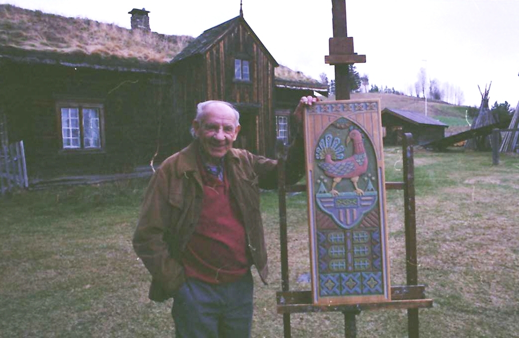 Magne Neby Holther med treskjæring/kunst/"Ulveskreet", mm. 