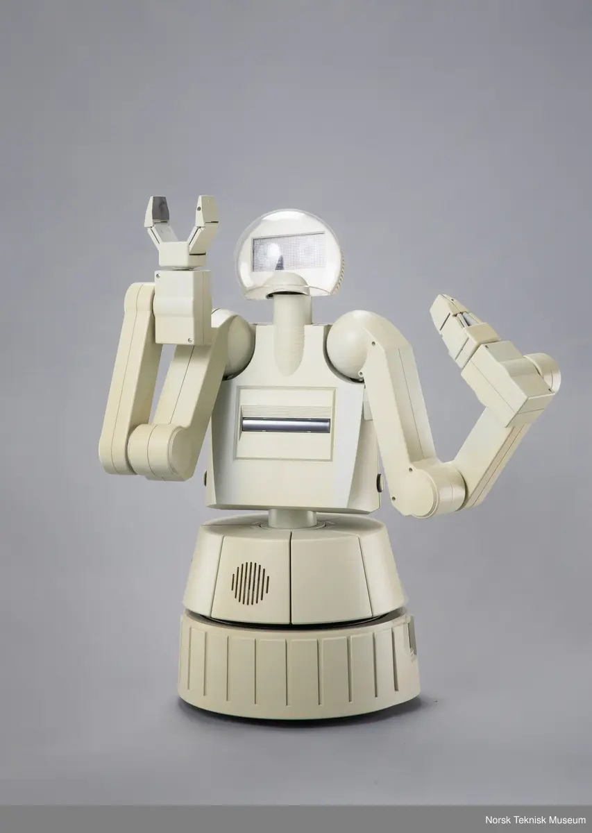 Tredelt datamaskin med robotarmer.