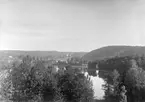 Panorama över Nystadviken i sjön Vindommen. Bild från Hägerstad slott mot Hannäs kyrkoruin och församlingens nya kyrka.