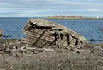 Vrak av estnisk eller finsk flyktbåt från andra världskriget på Synskär strand.