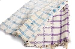 Handdukar med färgade rutmönster. Togs med på flykt från Est