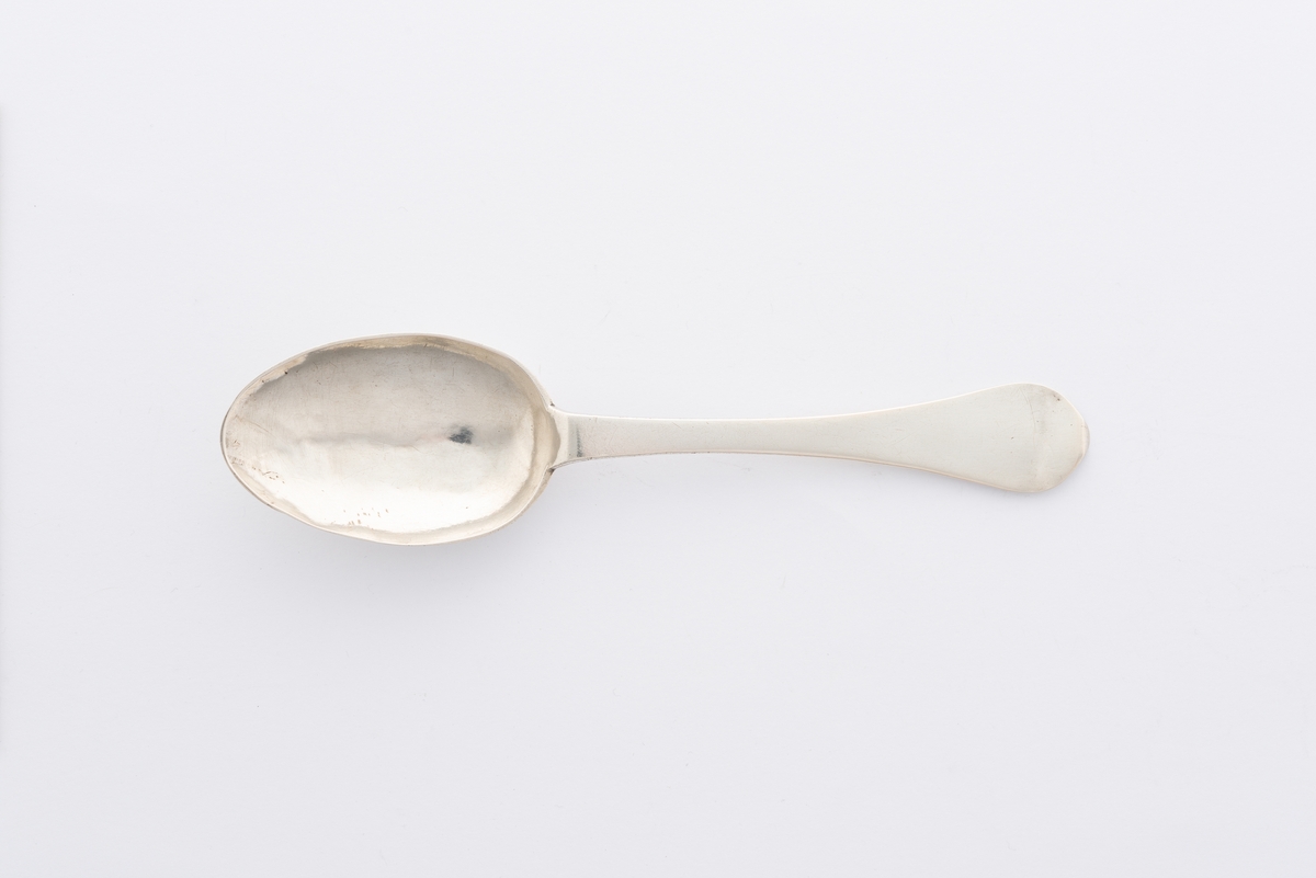 medaljong med blader