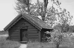 Tångeråsa kyrka, bårboden (bårhuset), liten timrad stuga.