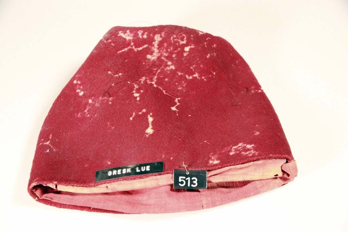 Grekerlue,  av rødt klede