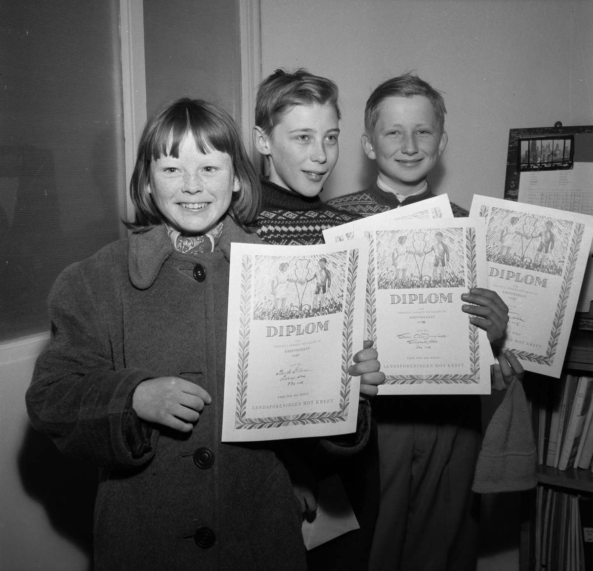 Diplomer til kreftmerkeselgere