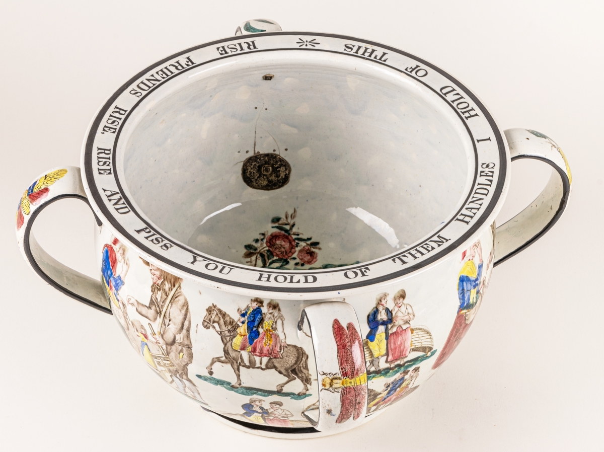 Nattkärl med 4 handtag, klickerade polykorma blommor och figurer, skämtsam inskrift: Rise friends rise, rise and piss, you hold of them handles, I hold of this".