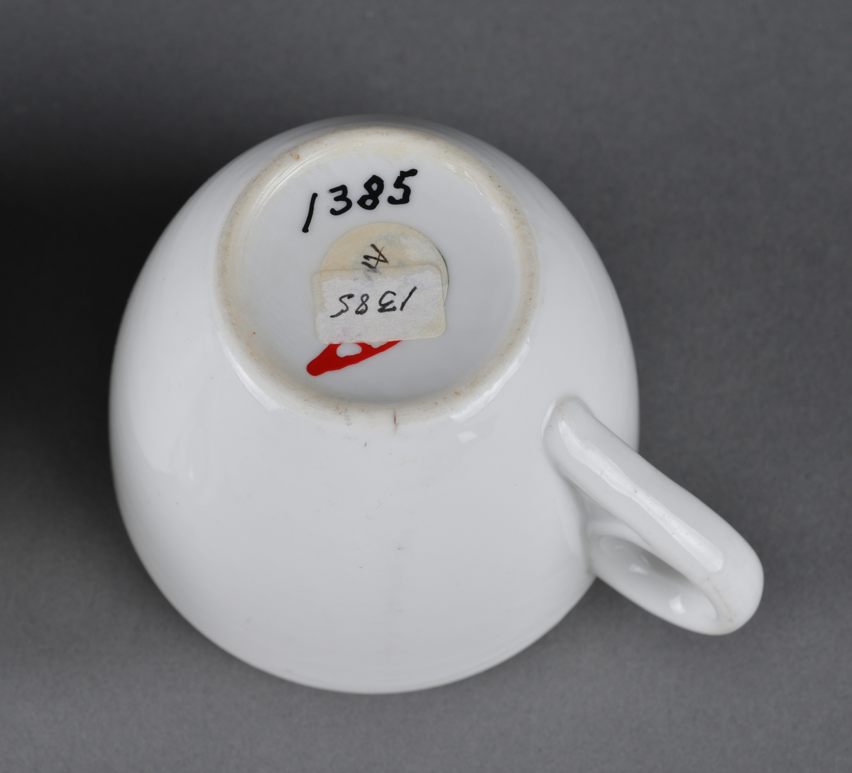 Kaffekopp med logo (NKS). 
Brukt ved kaffeservering i foreningen NKS (Norske Kvinners Sanitetsforening) på Asmundvåg