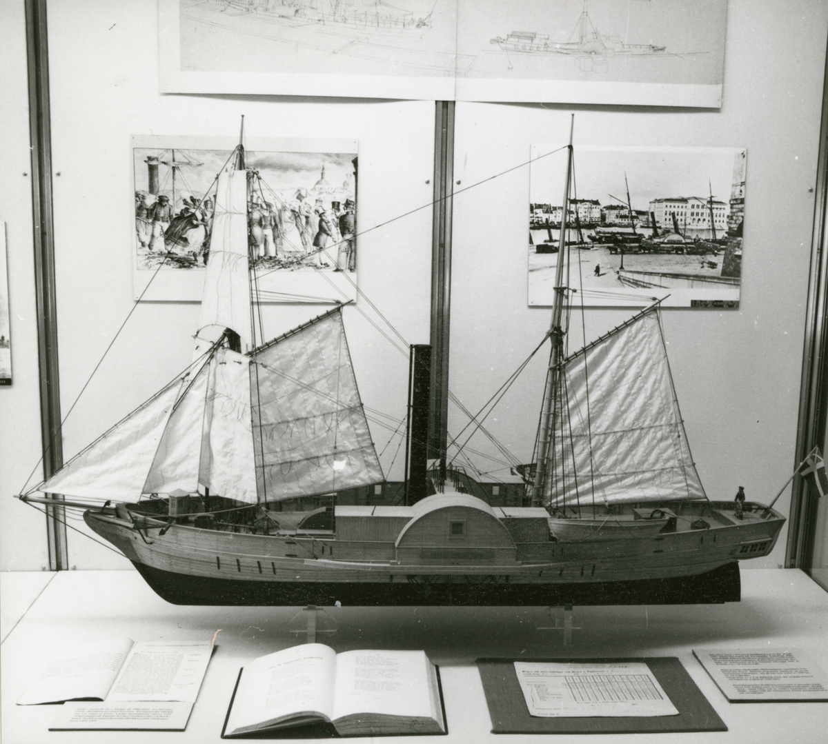 Launched in 1837, the Norrland was a wooden-hulled paddle-wheel steamship. She was the first steamer to maintain a regular service for passenger and freight transport between Stockholm and Umeå on the inlet of the Gulf of Bothnia. The ship was designed by the pionering Swedish engineer and industrialist Otto E Carlsund.

This 1/32 scale model was built from the original drawings at the Swedish National Maritime Museum between 1938 and 1942. 
