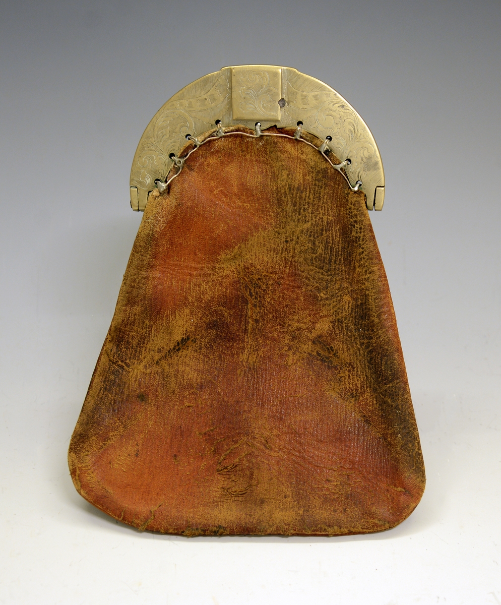 Pengepung. Fra protokollen: Pengepung med gravert messinglaas.