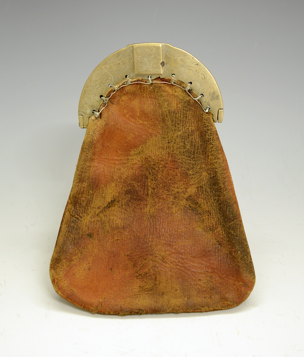 Pengepung. Fra protokollen: Pengepung med gravert messinglaas.