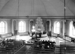 J.V. Björfeldt begravning. Likkista med blomsterarrangemang 