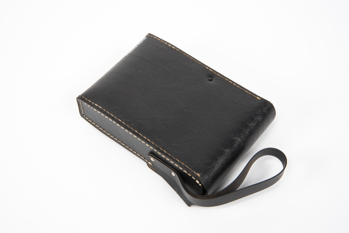 Digitalt tangmultimeter med etui.