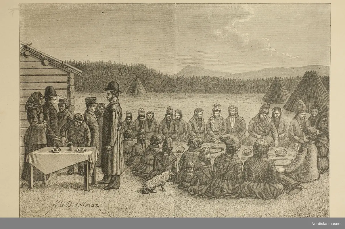 Grafiskt tryck. Påskrift: "Ett lappbröllop. Tafla av N. O. Björkman." Människor sitter vid ett långbord utomhus och firar bröllop. L.A. 1044