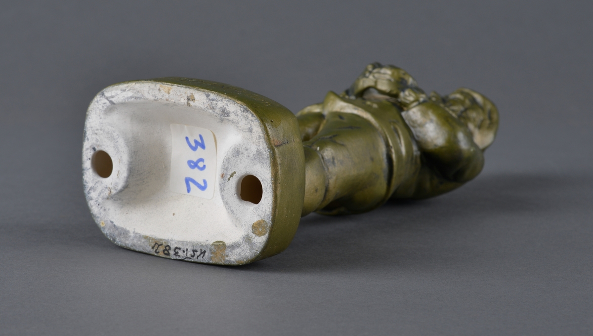 Mann med snadde og tobakkseske.
Reklame for Tiedemanns tobak