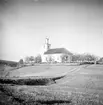 Häggdångers kyrka, 1930-tal. Byggmästare Pehr Hagmansson. Efter 60 år byggdes torn på kyrkan (1840-t). Vitputsad stenkyrka. Orgel från 1855 av J Gustav Ek. Altartavla från 1795 av målare Anders Joakim Öberg från Härnösand. Altaruppsatsen från 1797-98 av bildhuggare Per Vestman från Hemsö.