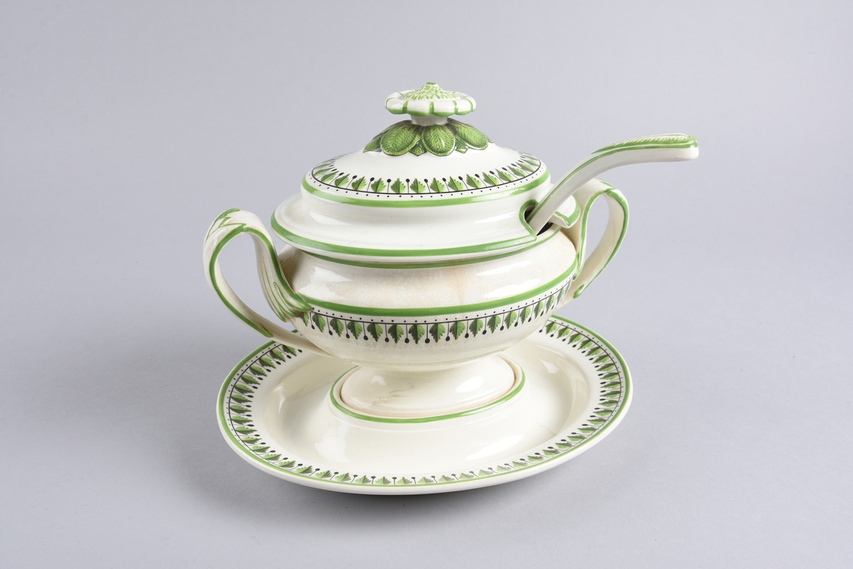 Bord av stiliserte blader. Blomst