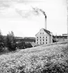 Utansjö Cellulosa AB, tillkommet 1897 på konsul Fritz Versteeghs förslag för att tillvarata klentimmer. Fabriken togs i drift i mars 1900. 1904 beskrevs fabriken enligt följande i försäkringspappren: Alla fabrikshusen äro uppförda av sten med gavelspetsar av sten och utan överskjutande taksprång av trä samt under tak av asfaltpapp. Många äldre byggnader är rivna, men huvudfabriken står kvar.