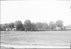 Vy mot Missionshuset och Nya apoteket, Sjötorget, Östhammar, Uppland omkring 1910