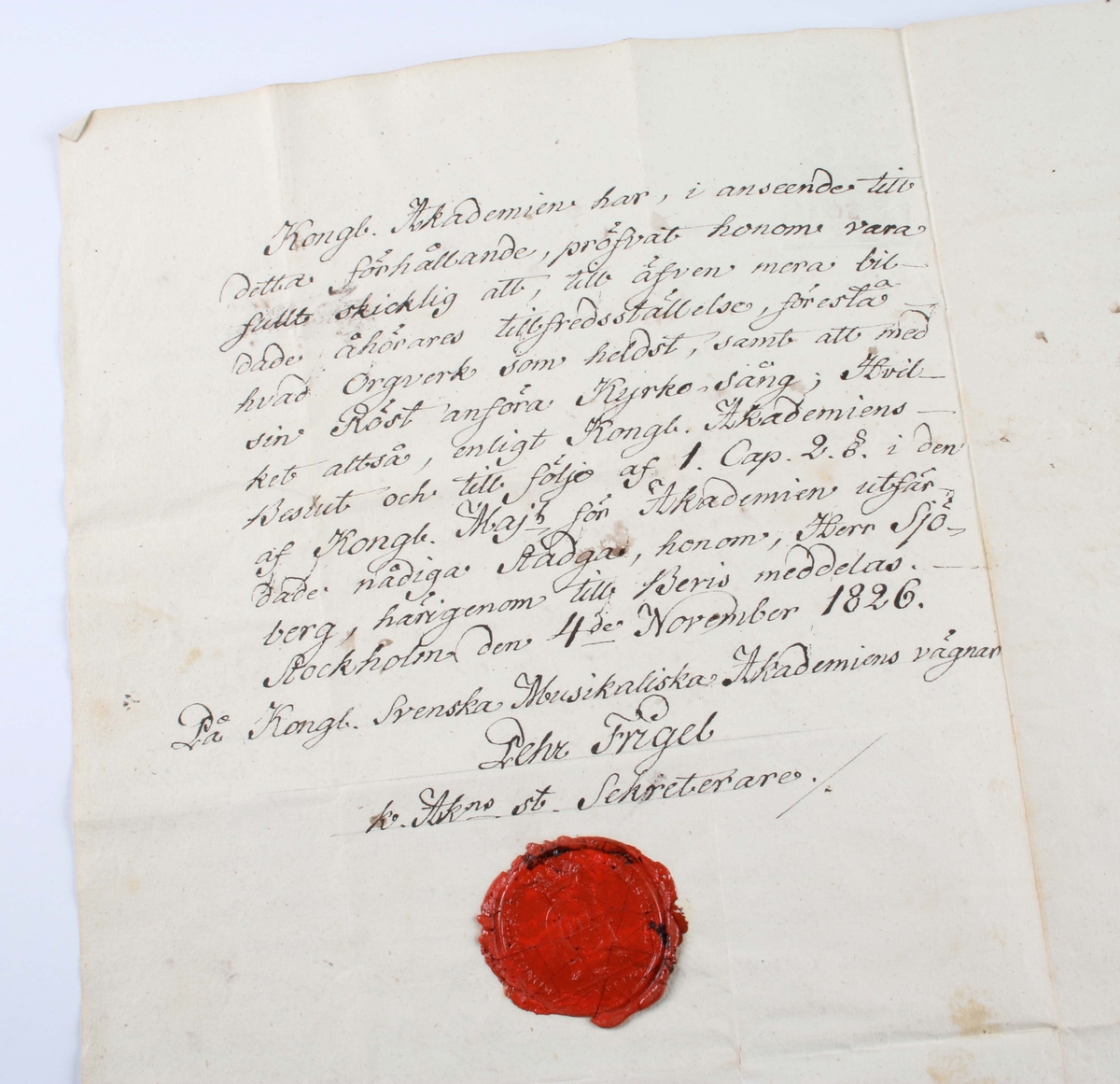 Diverse handlingar och brev, rörande Jonas Fredrik Sjöberg, organist och klockare i Borås. Grågrönt papper med handskriven svart text. Vissa stämplade med rött lacksigill. Märkta med årtal 1825, 1826, 1828 och 1837.