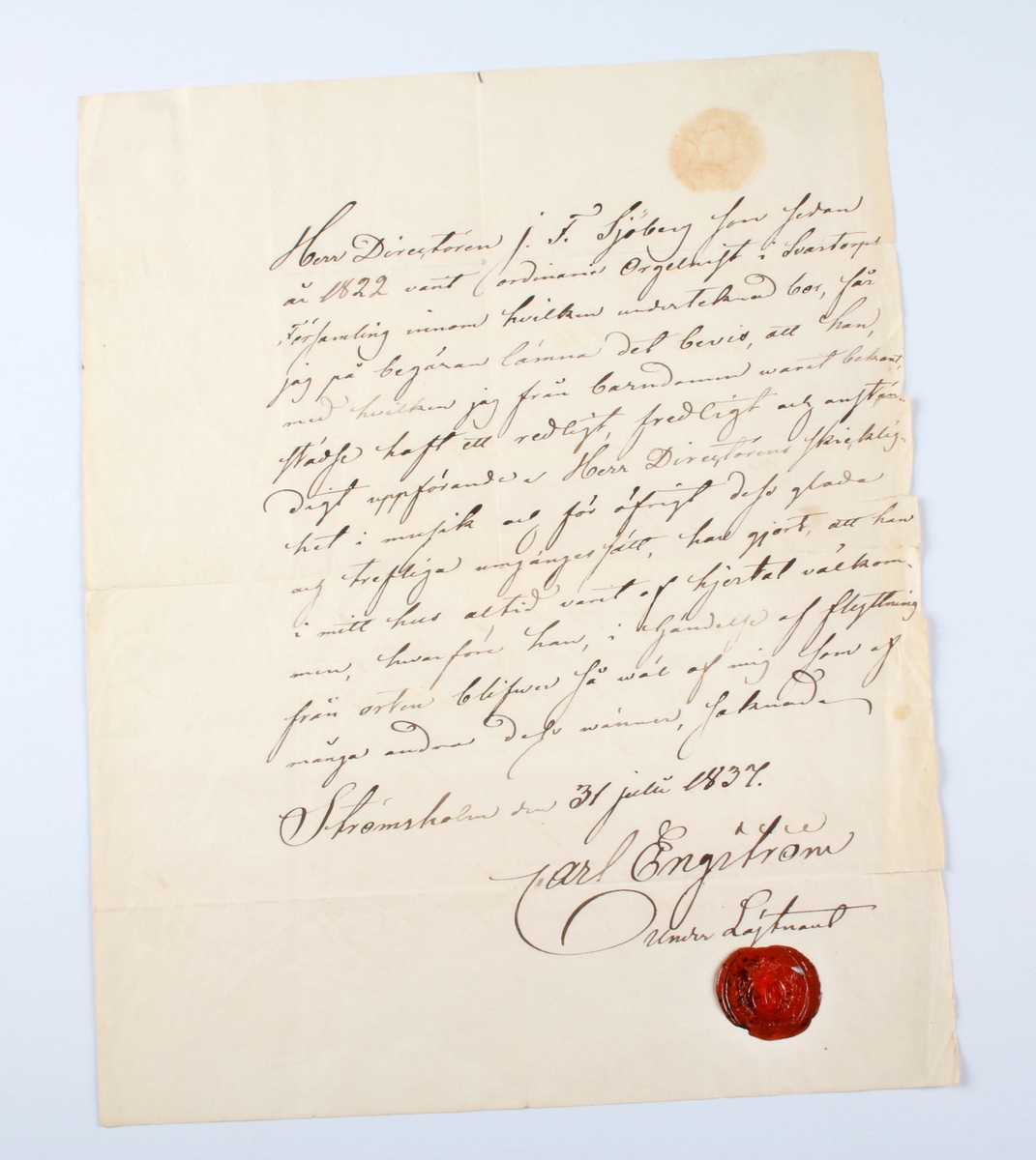 Diverse handlingar och brev, rörande Jonas Fredrik Sjöberg, organist och klockare i Borås. Grågrönt papper med handskriven svart text. Vissa stämplade med rött lacksigill. Märkta med årtal 1825, 1826, 1828 och 1837.