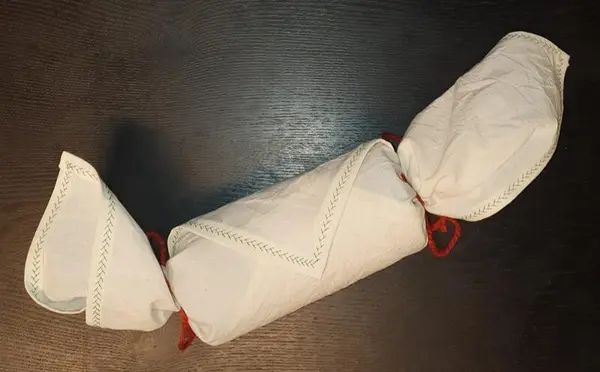 Tekstil gaveinnbakning, hvitt bomullslerret