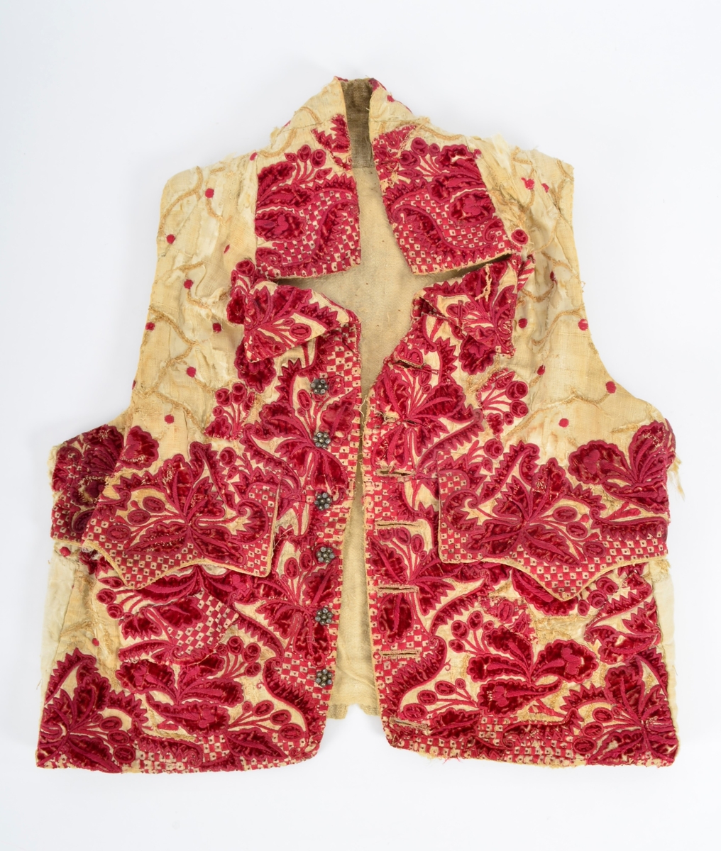 Vest med brodert mønster, applikasjoner av plysj.