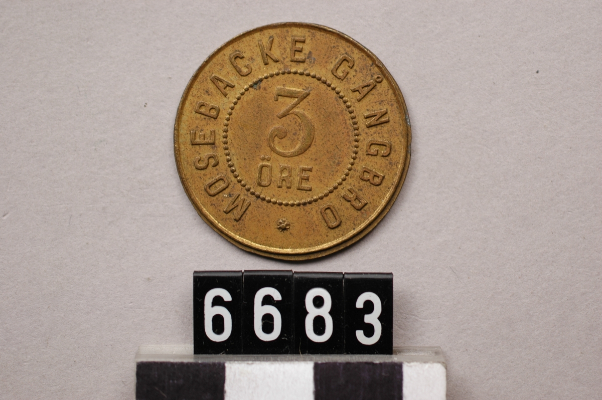 Pollett av mässing.