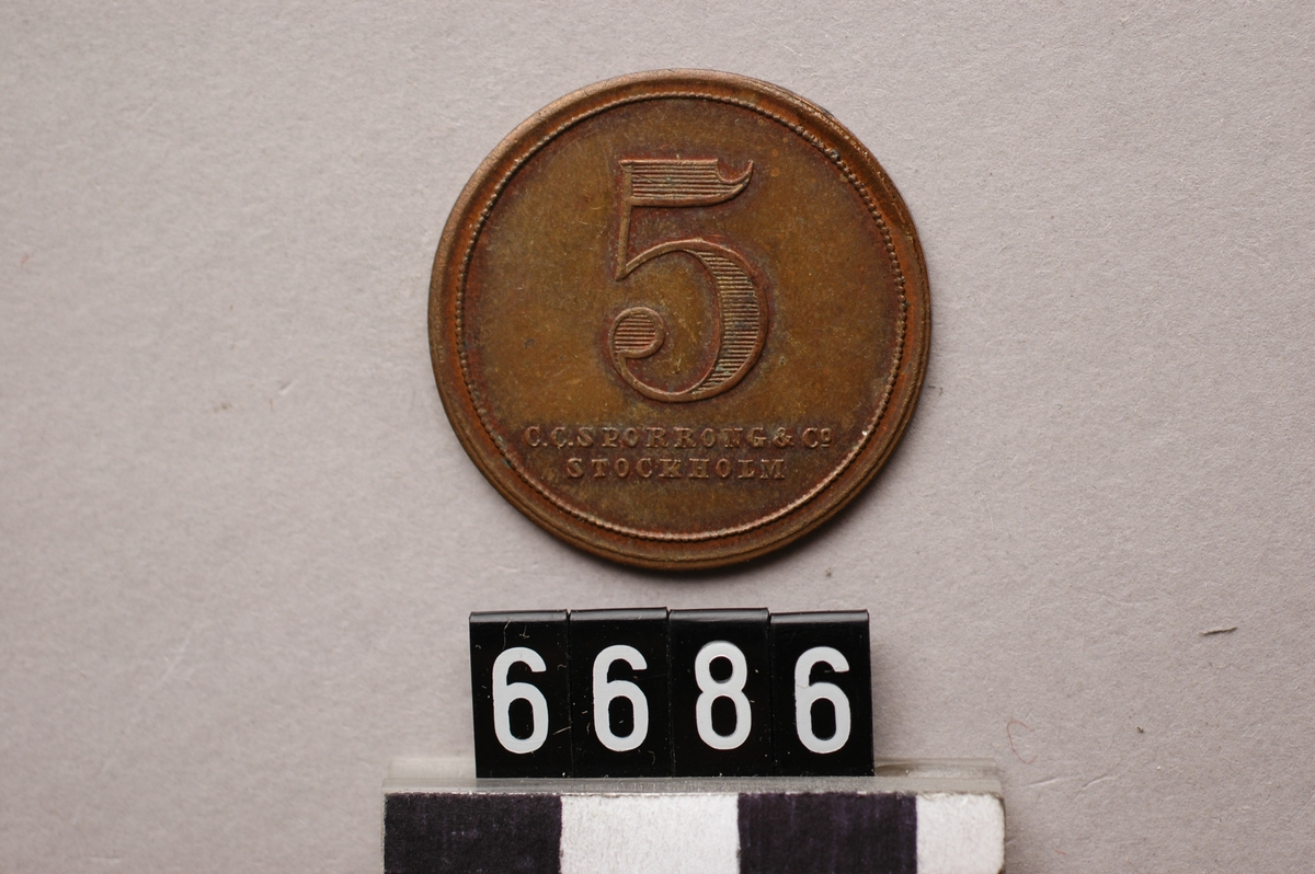 Av koppar. Användningsområde obekant. märkt: C.C.Sporrong & Co, 5