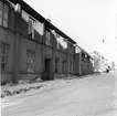 Stadsbebyggelse. Byggnaderna rivna 1959.