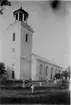 Timrå kyrka. Byggmästare Per Hagmansson. Vitputsad stenkyrka med torn. 1833-35 ändring  av tornöverbyggnaden (rundtempel).