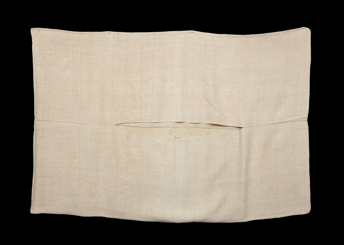 Fässing. madrassvar, av grovt blaggarn, vävt i kypert, hopsytt av fyra 610 x1820 mm stora stycken. En av mittsömmarna öppen ca 1000 mm på mitten för stoppningen. Vävt senast på 1890-talet. Söndrigt på två ställen.