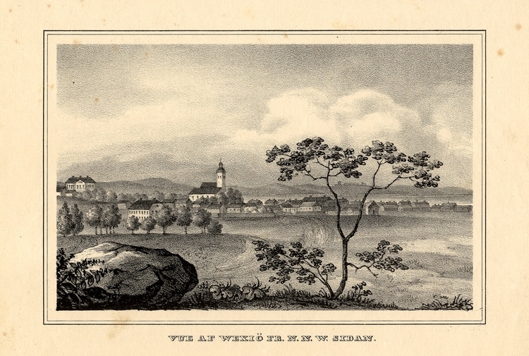 Litografi.
Vy av Växjö från nordnordväst. Man ser domkyrkan, Östrabo m.m.
Ur planschverk.
