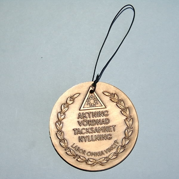 Rund bronsmedalj. Diameter 5,7 cm.Porträttrelief av Oskar Eklund (1861 - 1931). Tempelriddareordens stormästare 1903-1940.