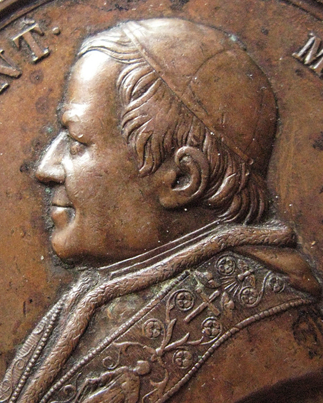 Motiv advers: Pave Pius IX, byste i profil mot venstre.

Motiv revers: Søylen som pave Pius IX i 1865 lot reise foran San Lorenzo fuori le mura.