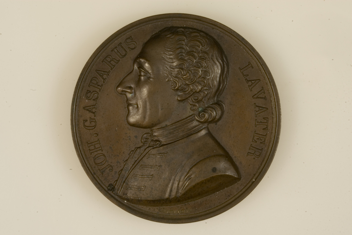 Motiv advers: Forfatteren Johann Kaspar Lavater, byste i profil mot venstre.

Motiv revers: Tekst.