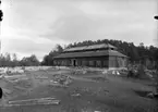 Under uppförande, Hallstahammars herrgård, taget från Tenngjutargården, på Vallby friluftsmuseum i Västerås.