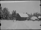 Kyrkstallet med julkors, på Vallby friluftsmuseum i Västerås.