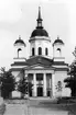 Domkyrkan Härnösand. Arkitekt Johan Adolf Hawerman. Nyklassistisk stil. Vitputsad stenkyrka med ett mittorn,t vå mindre torn och västfasad med pelarrad. En del inventarier från den äldre kyrkan bland annat altartavlan från 1700-talet.Treskeppigt   från 1731 av Johan Caliman med barockfasad av Magnus Granlund från Hudiksvall