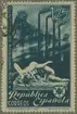 Frimärke ur Gösta Bodmans filatelistiska motivsamling, påbörjad 1950. Frimärke från Spanien, 1938. Motiv av Industrianläggningar i Spanien samt monument över i kriget stupade arbetare.
