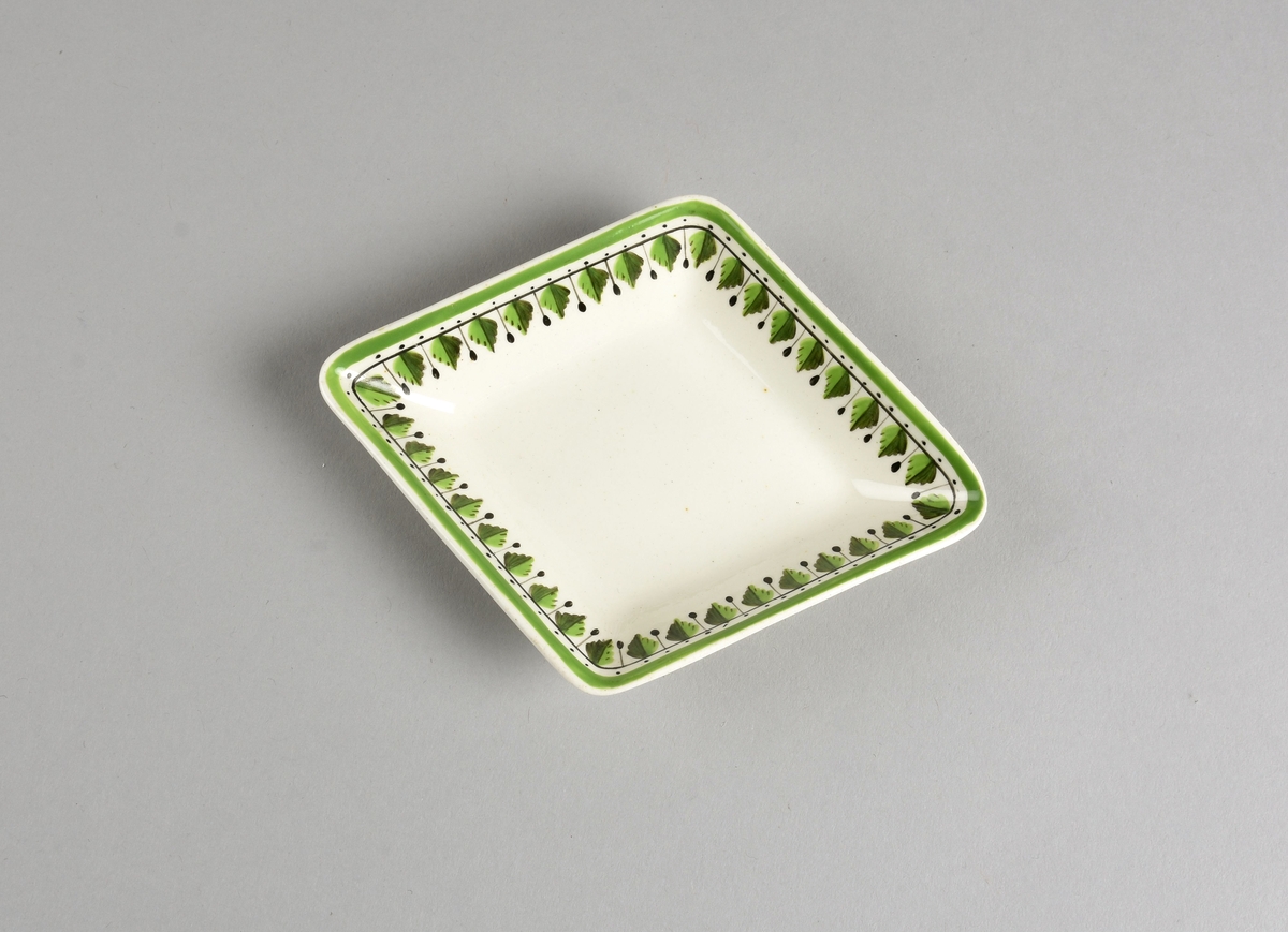 Bord av stiliserte blader